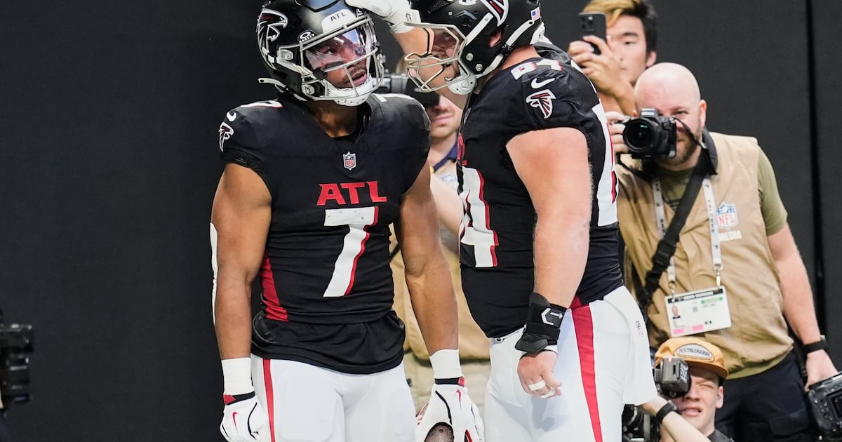 Bijan Robinson's Electrifying TD Ignites Falcons' Playoff Hopes, Defying Losing Streak!