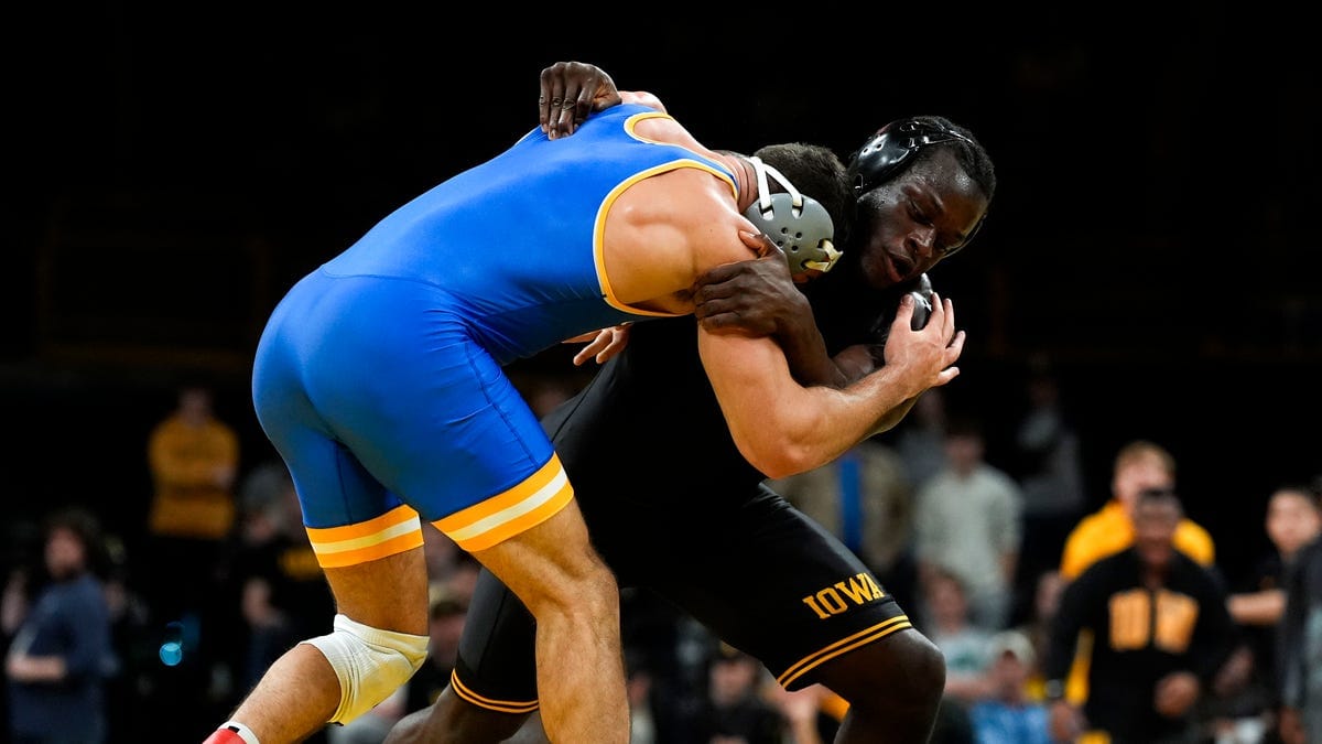 Iowa Wrestler Massoma Endene Removed from Roster